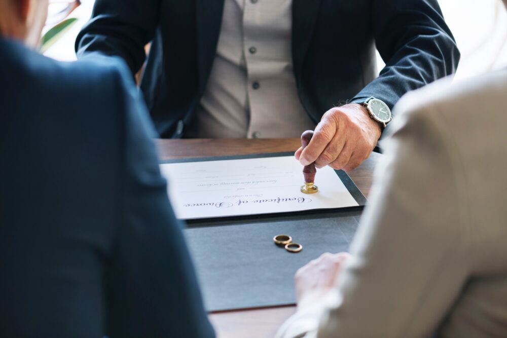 couple signing document