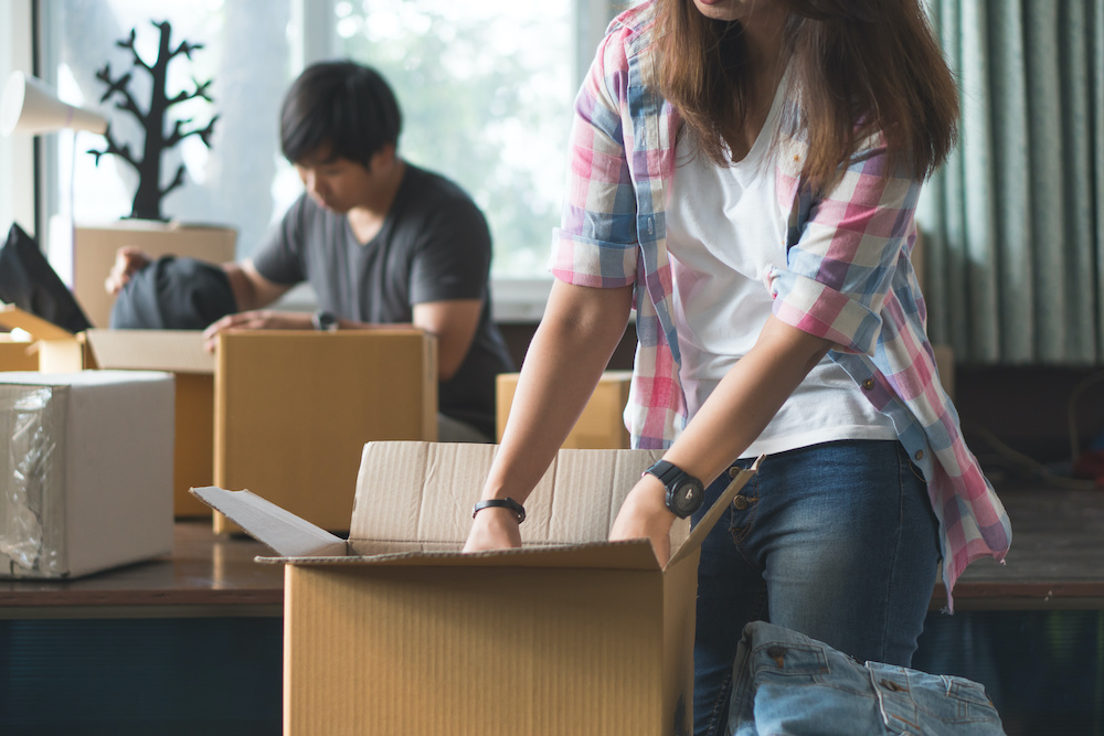 couple moving boxes