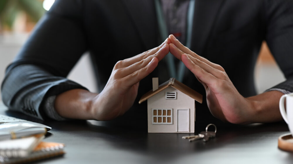 hands over house