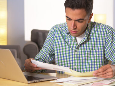 man paying bills
