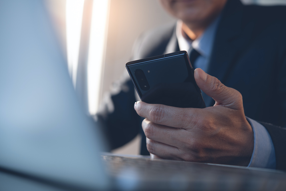 man holding phone